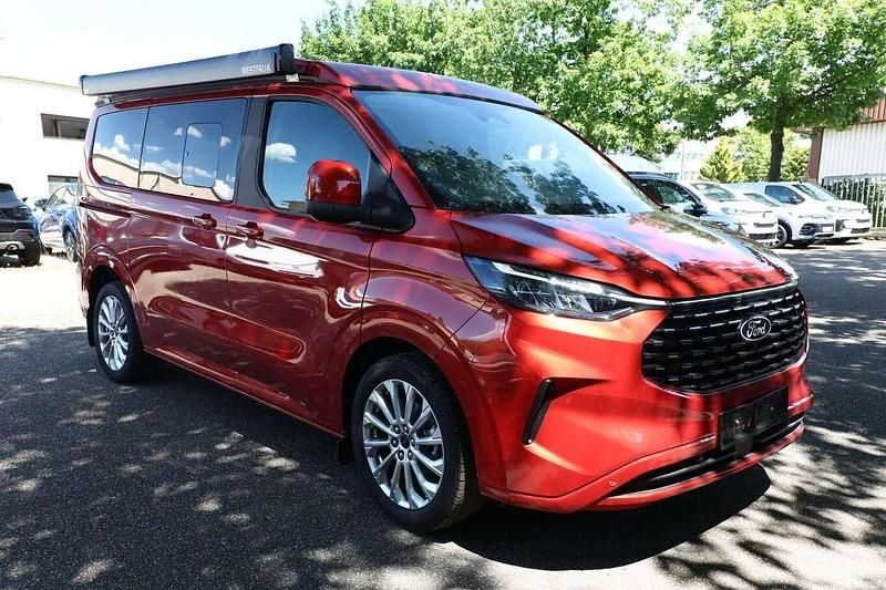 Artisan red metallic Neu 2025 Ford Tourneo Custom Nugget Van / Kleinbus | 62.954 € (Guter Preis) - Bild 1/4