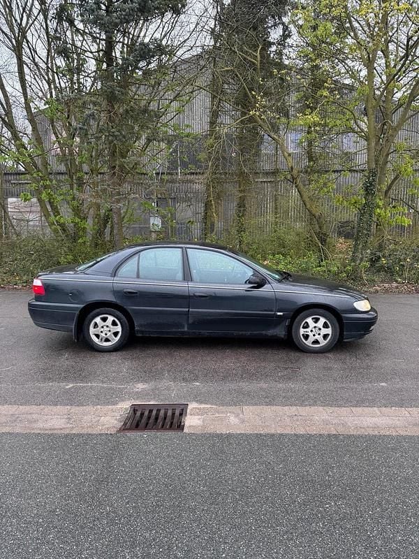 Second-hand Opel Omega 144 CP (105 kW) 2003 Negru Berlinǎ
