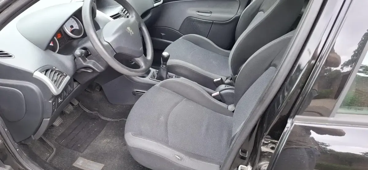 Gebraucht Peugeot 206+ 75 PS (55 kW) 2009 Schwarz Kleinwagen