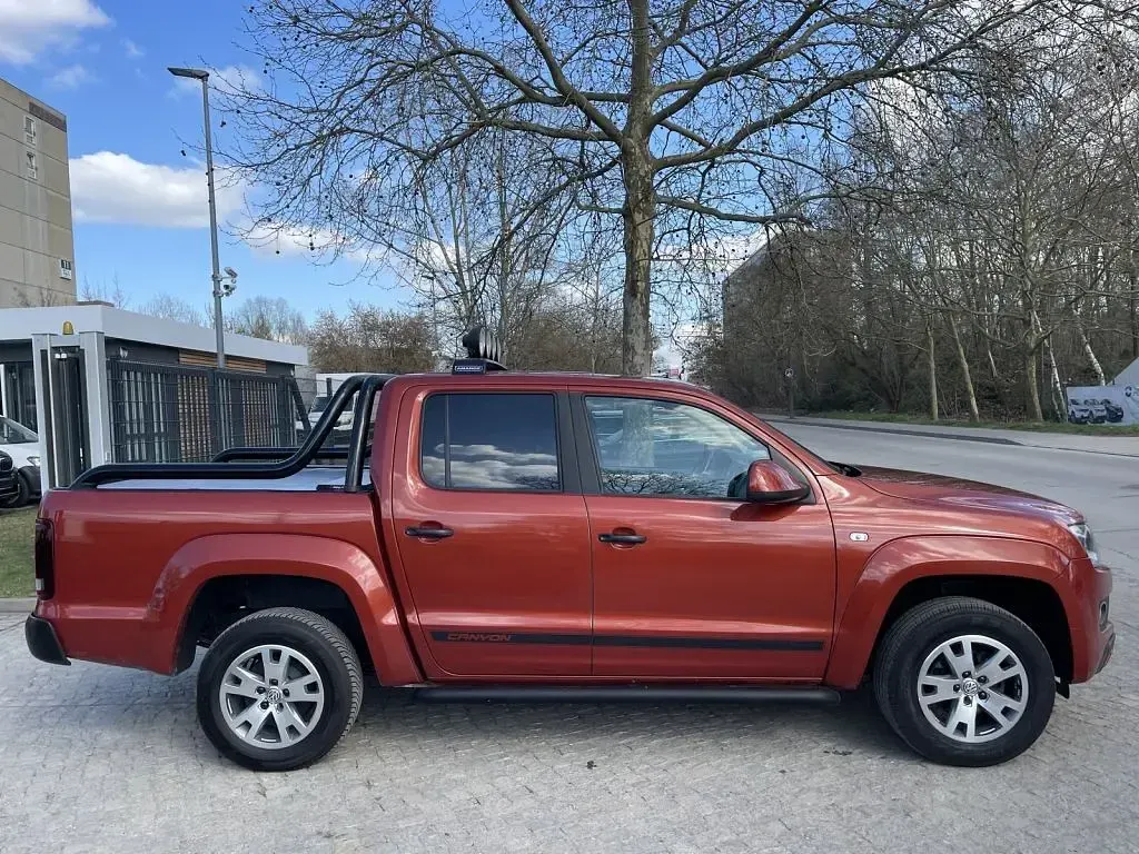 Second-hand VW Amarok 179 CP (131 kW) 2013 Portocaliu Pickup