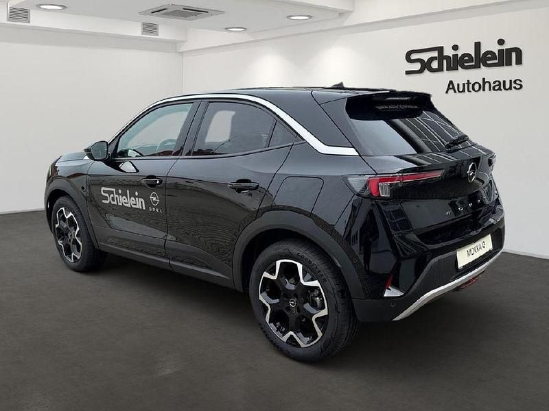 Gebraucht Opel Mokka-e Ultimate 100 kW (136 PS) 2023 Diamant schwarz/karbon schwarz SUV