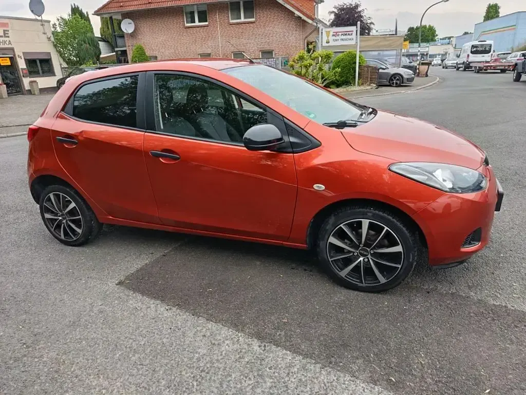 Gebraucht Mazda 2 Active 75 PS (55 kW) 2010 Orange Kleinwagen