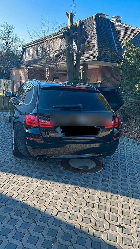 Gebraucht BMW 520 184 PS (135 kW) 2011 Schwarz Kombi