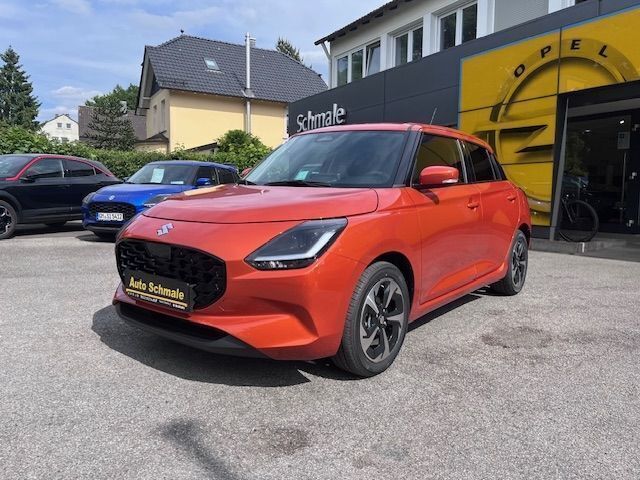 Orange Neu 2025 Suzuki Swift Comfort+ Limousine | 22.350 € - Bild 1/4