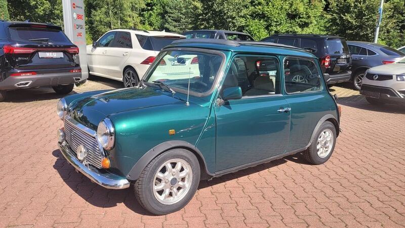 Britishgrün (metallic) Gebraucht 1996 Mini 1300 Kleinwagen | 8.990 € (Fairer Preis) - Bild 1/4