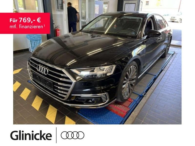 Mythosschwarz metallic Gebraucht 2021 Audi A8L Ambiente Limousine | 56.805 € (Fairer Preis) - Bild 1/2