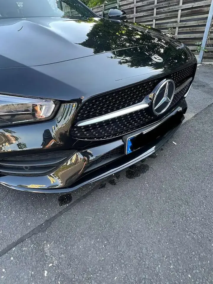 Gebraucht Mercedes CLA200 AMG line 163 PS (119 kW) 2023 Schwarz Coupé