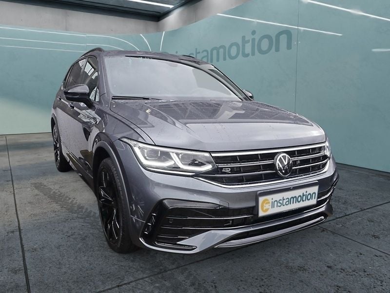 Grau Gebraucht 2024 VW Tiguan Allspace R-line SUV | 47.180 € (Fairer Preis) - Bild 1/4