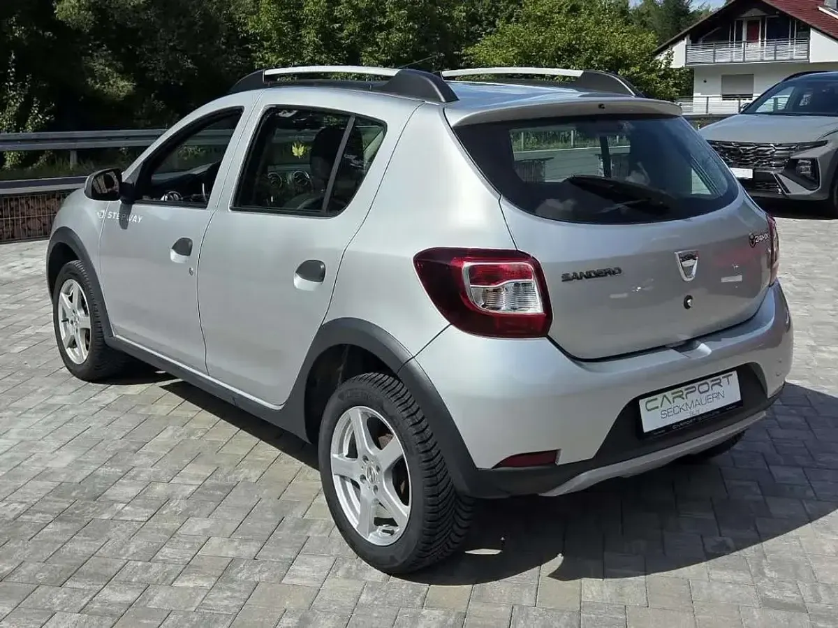 Gebraucht Dacia Sandero Prestige 90 PS (66 kW) 2015 Platingrau Kleinwagen