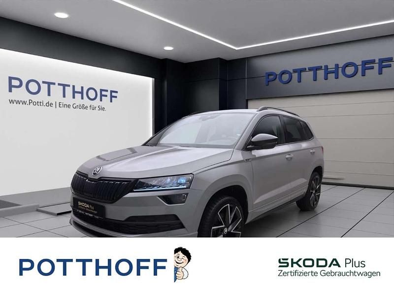 Grau Gebraucht 2020 Skoda Karoq SportLine SUV | 26.877 € (Fairer Preis) - Bild 1/4