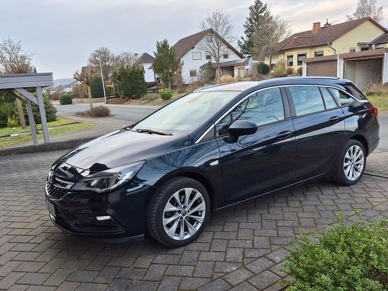 Gebraucht Opel Astra 110 PS (80 kW) 2016 Grün Kombi