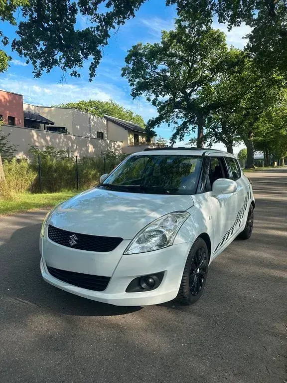 Gebraucht Suzuki Swift Comfort+ 94 PS (69 kW) 2013 Weiß Kleinwagen