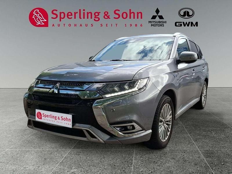 Platinum grau Gebraucht 2019 Mitsubishi Outlander P-HEV Top SUV | 20.990 € (Fairer Preis) - Bild 1/4