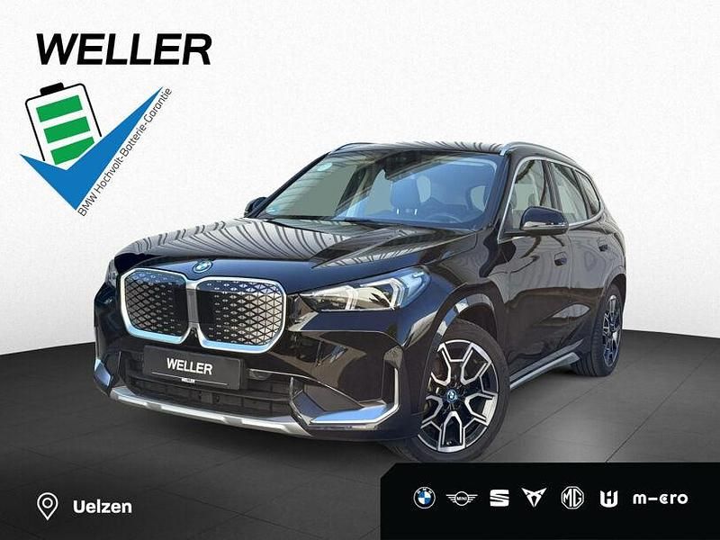 Schwarz ii (schwarz) Gebraucht 2024 BMW iX1 Performance SUV | 42.490 € (Fairer Preis) - Bild 1/3