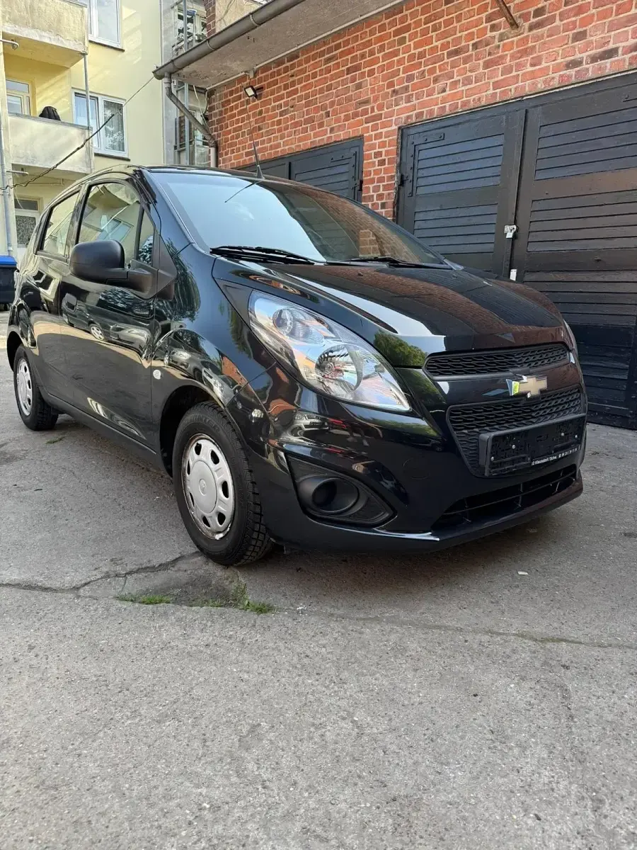 Gebraucht Chevrolet Spark 68 PS (50 kW) 2014 Schwarz Kleinwagen