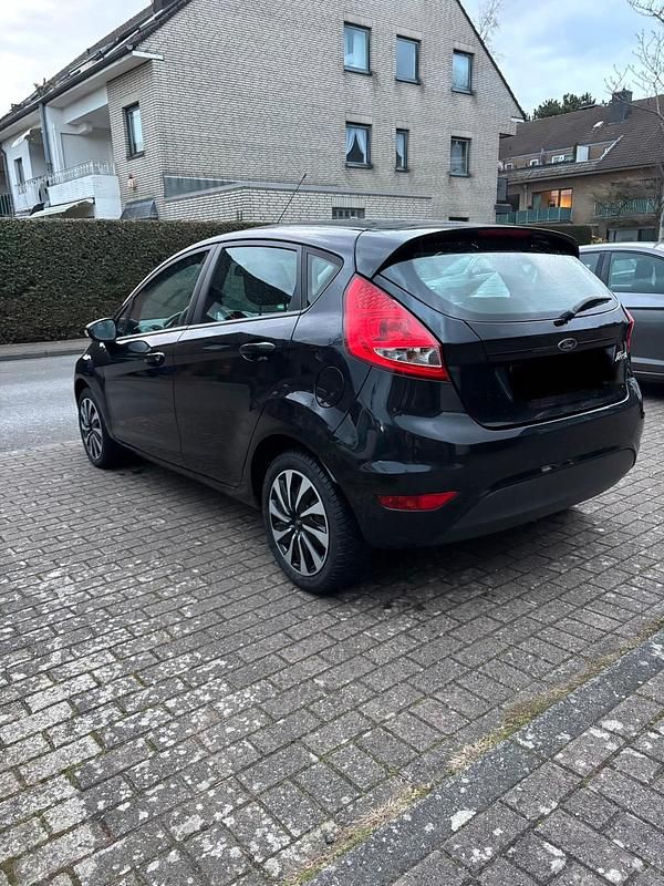 Gebraucht Ford Fiesta Trend 82 PS (60 kW) 2011 Schwarz Kleinwagen