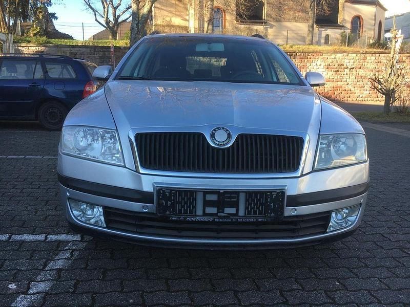 Second-hand Skoda Octavia Ambiente 105 CP (77 kW) 2008 Argintiu Break