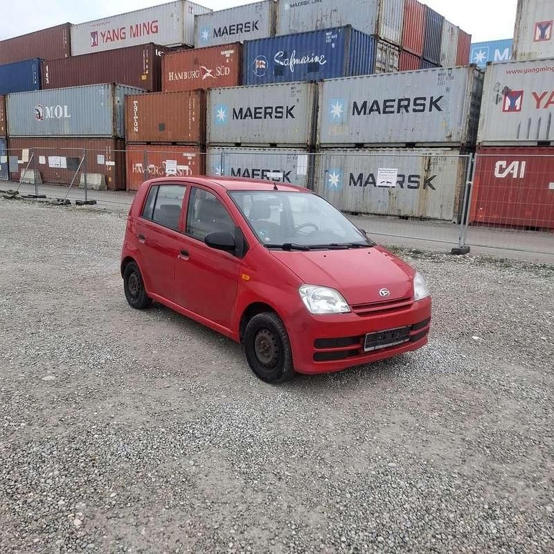 Gebraucht Daihatsu Cuore Plus 58 PS (42 kW) 2006 Rot Kleinwagen