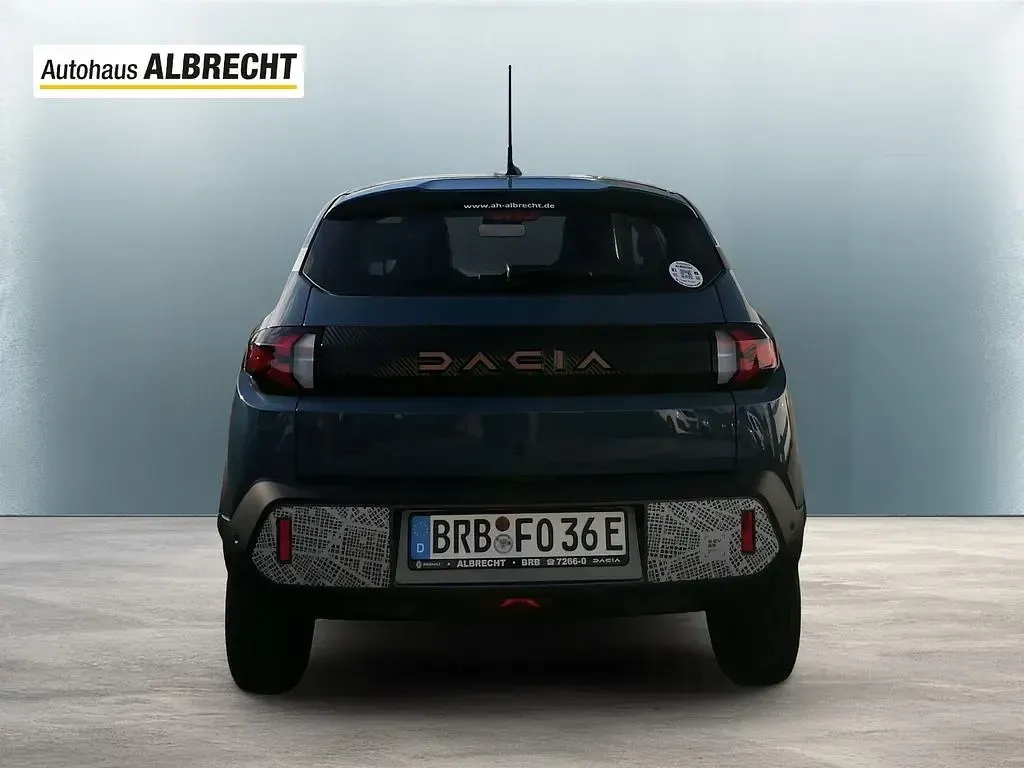 Gebraucht Dacia Spring Extreme 47 kW (65 PS) 2025 Schieferblau Kleinwagen