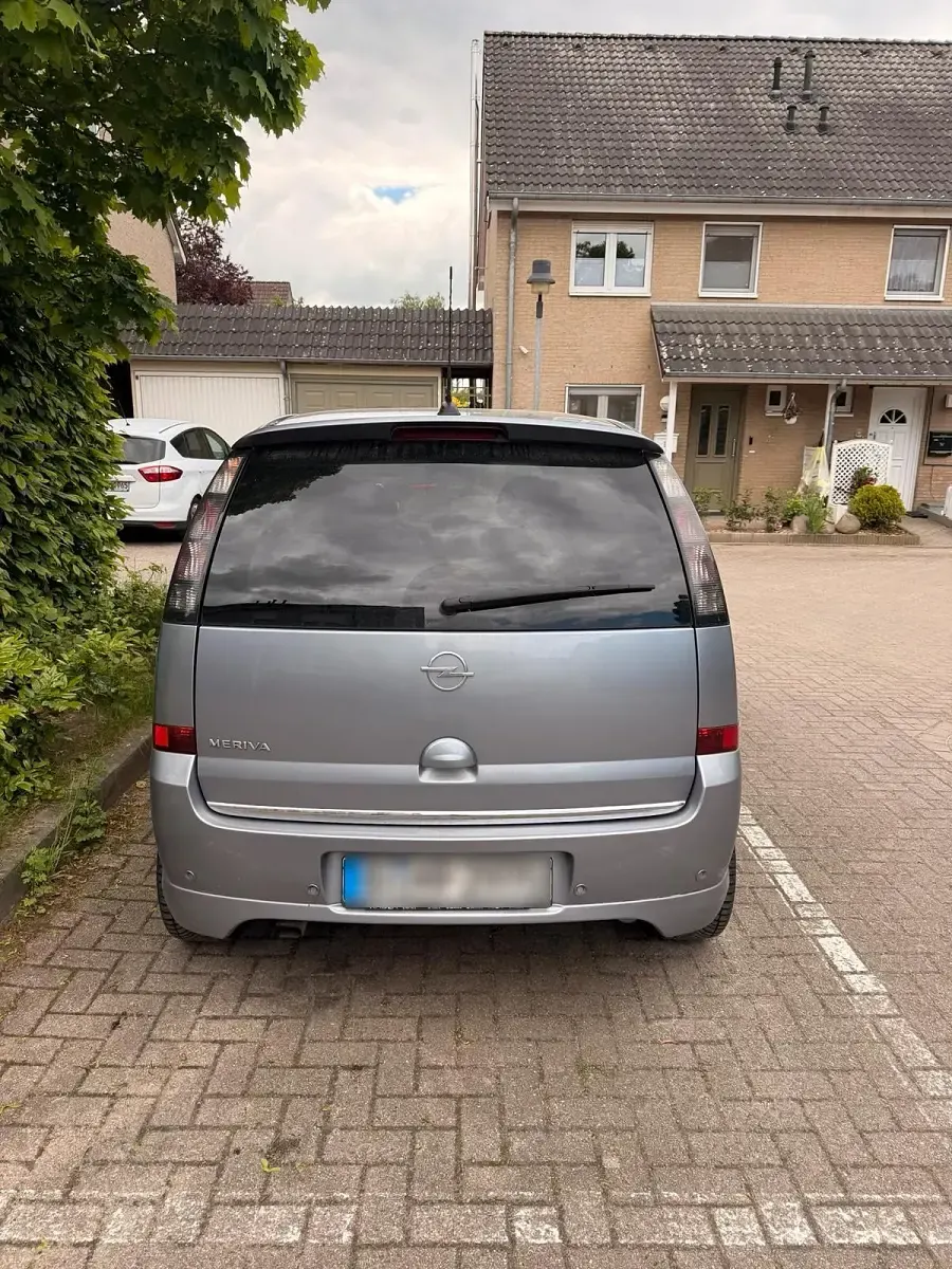 Używany Opel Meriva OPC 129 KM (94 kW) 2009 Srebrny Minivan