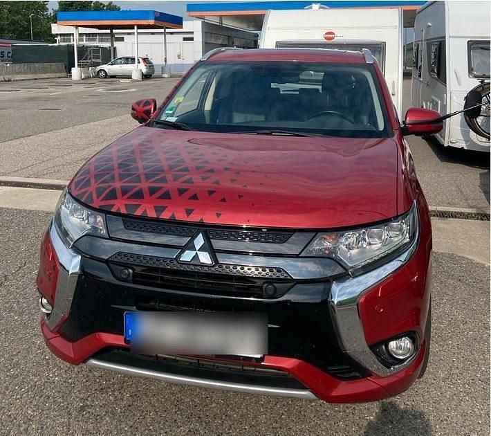 Rot Gebraucht 2015 Mitsubishi Outlander P-HEV Top SUV | 13.500 € (Fairer Preis) - Bild 1/4