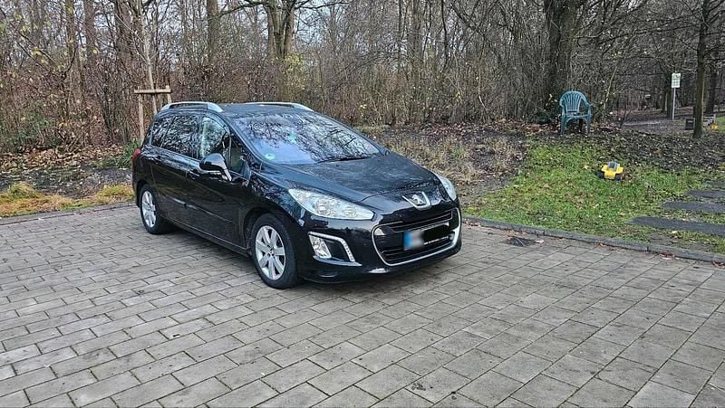 Gebraucht Peugeot 308 Active 112 PS (82 kW) 2013 Schwarz Kombi