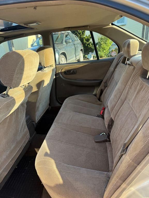 Gebraucht Nissan Primera 116 PS (85 kW) 1992 Braun Limousine