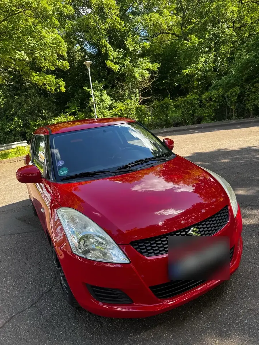 Gebraucht Suzuki Swift 94 PS (69 kW) 2012 Rot Kleinwagen