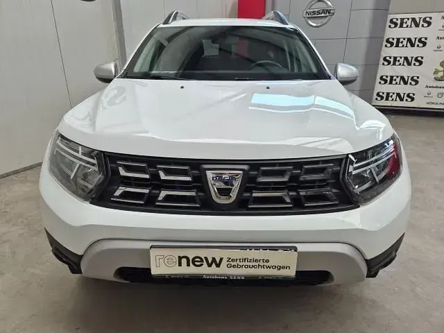 Używany Dacia Duster Prestige 101 KM (74 kW) 2021 Biały SUV