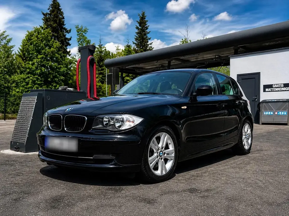 Gebraucht BMW 116 116 PS (85 kW) 2010 Schwarz Kleinwagen