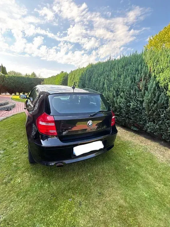 Gebraucht BMW 116 122 PS (89 kW) 2009 Schwarz Kleinwagen