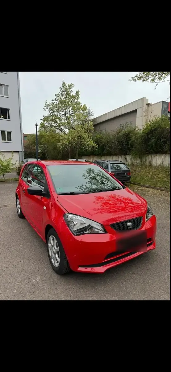 Używany Seat Mii 60 KM (44 kW) 2013 Czerwony Hatchback