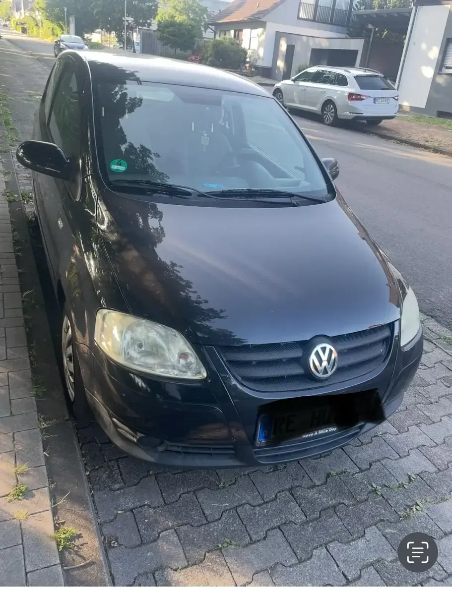 Gebraucht VW Fox 55 PS (40 kW) 2010 Schwarz Kleinwagen