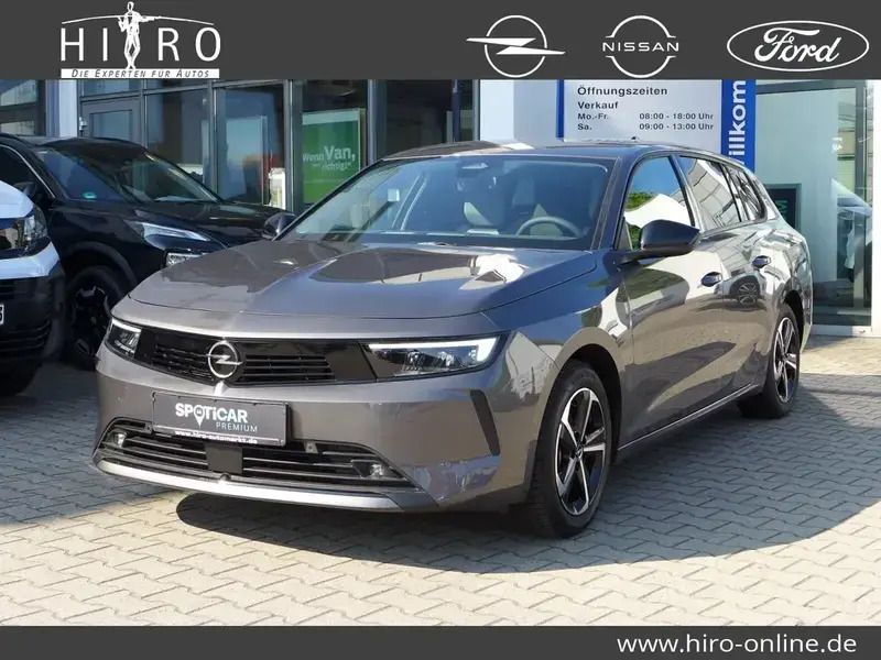 Grau/typ aussenverkleidung lackierung Gebraucht 2024 Opel Astra Enjoy Kombi | 23.990 € (Fairer Preis) - Bild 1/4
