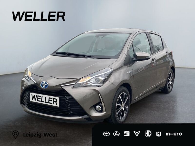 Bronze Gebraucht 2018 Toyota Yaris Hybrid Team Kleinwagen | 15.990 € (Fairer Preis) - Bild 1/3
