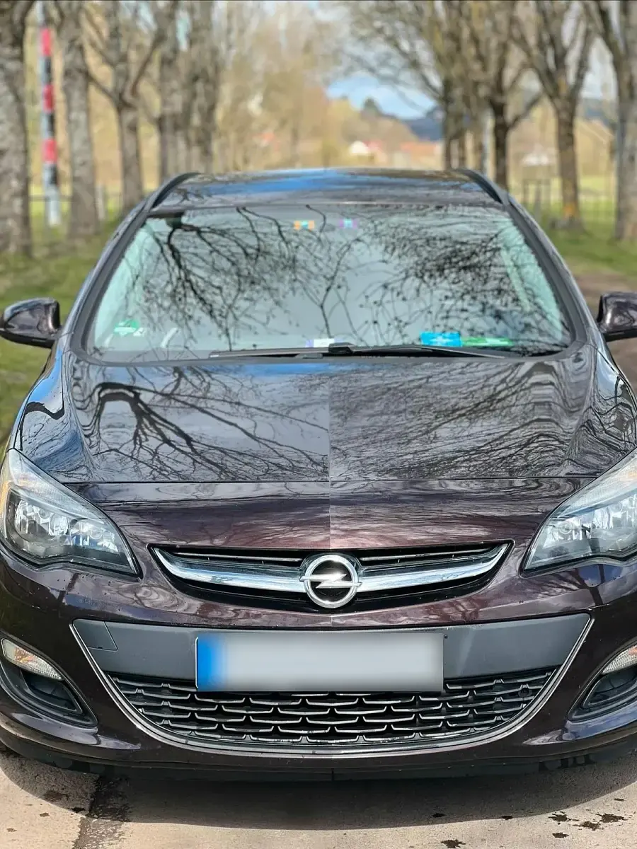 Second-hand Opel Astra 141 CP (103 kW) 2014 Maro Break