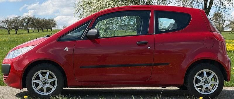 Second-hand Mitsubishi Colt Inform 75 CP (55 kW) 2008 Roșu Berlinǎ