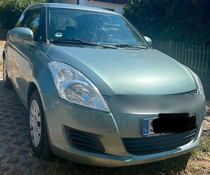 Grün Gebraucht 2011 Suzuki Swift Kleinwagen | 4.200 € - Bild 1/4