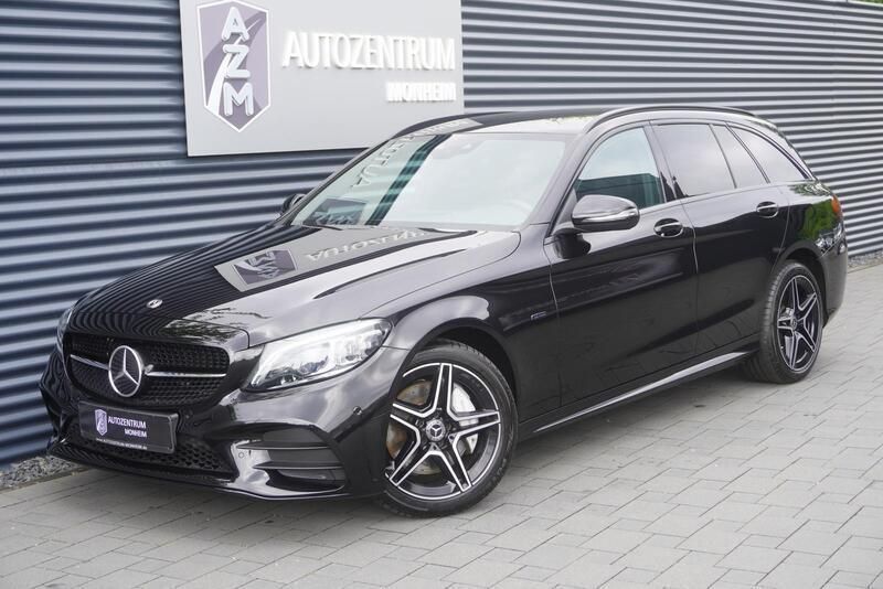Obsidianschwarz metallic Gebraucht 2021 Mercedes C300e AMG line Limousine | 29.990 € (Guter Preis) - Bild 1/4
