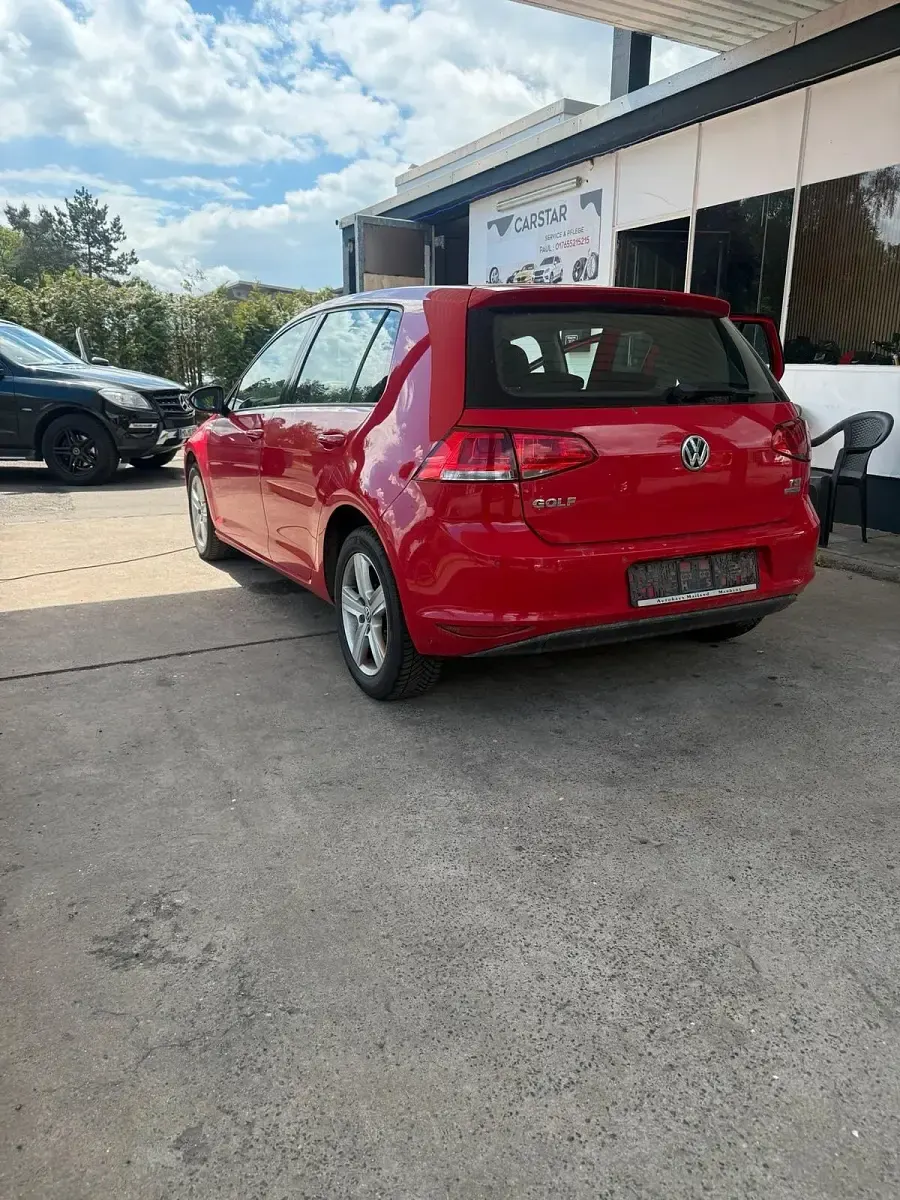 Second-hand VW Golf VII 85 CP (62 kW) 2013 Roșu Berlinǎ