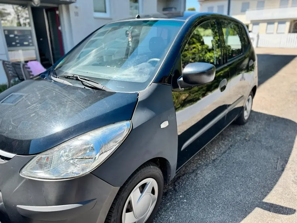 Gebraucht Hyundai i10 67 PS (49 kW) 2011 Schwarz Kleinwagen