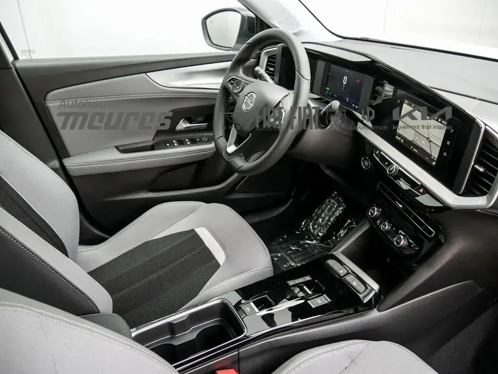 Gebraucht Opel Mokka-e Elegance 100 kW (136 PS) 2023 Weiss SUV