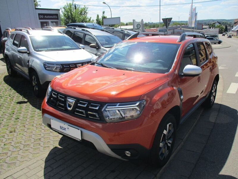 Orange Gebraucht 2022 Dacia Duster Prestige SUV | 19.490 € (Fairer Preis) - Bild 1/4