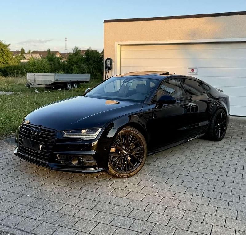 Schwarz Gebraucht 2015 Audi A7 Comfort Kleinwagen | 28.000 € - Bild 1/4