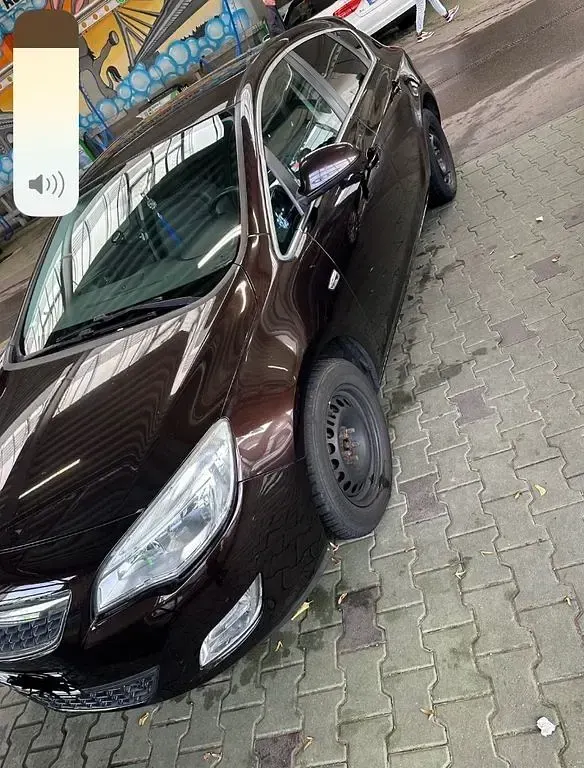 Używany Opel Astra 140 KM (102 kW) 2012 Brązowy Sedan/Limuzyna