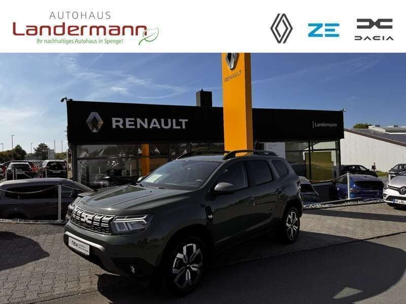 Safarigrüngrau Gebraucht 2023 Dacia Duster Journey SUV | 20.990 € (Fairer Preis) - Bild 1/4