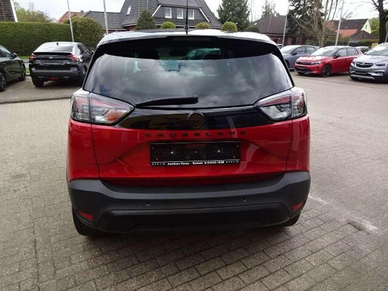 Gebraucht Opel Crossland Elegance 110 PS (80 kW) 2023 Lackierung peperoncino red/met SUV