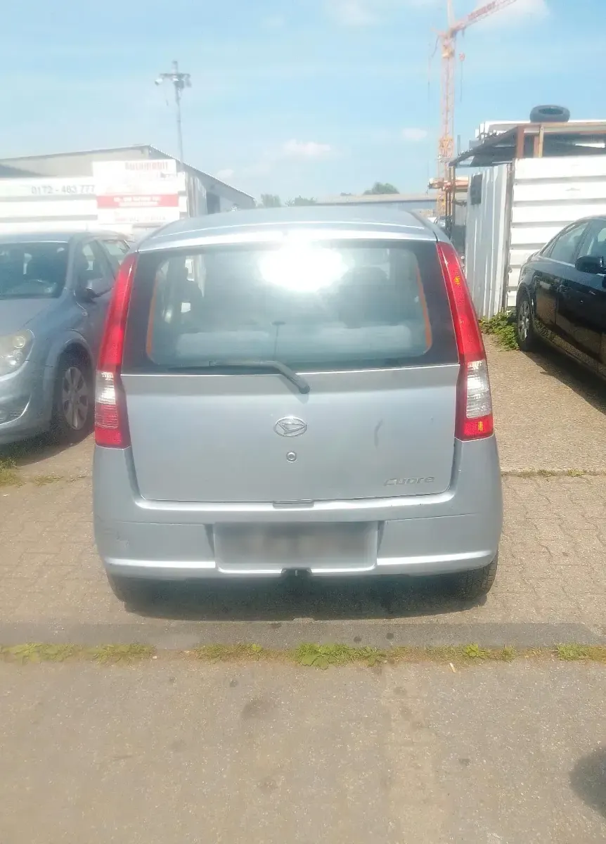 Gebraucht Daihatsu Cuore 60 PS (44 kW) 2004 Grau Kleinwagen