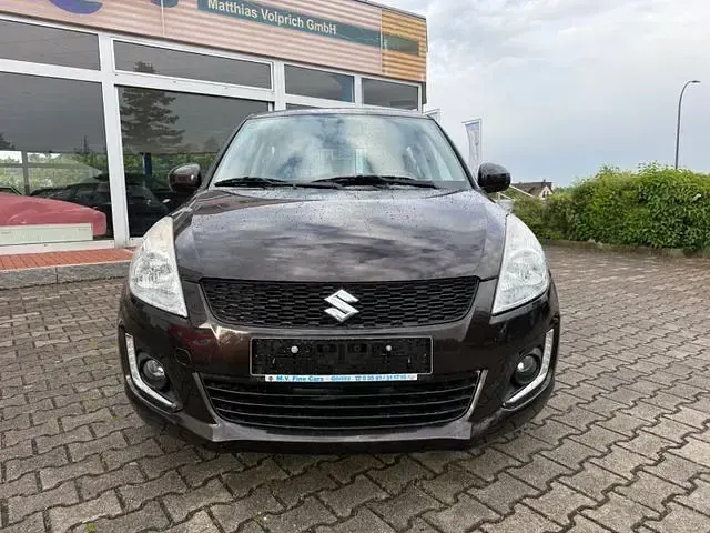Gebraucht Suzuki Swift Club 94 PS (69 kW) 2015 Braun Kleinwagen