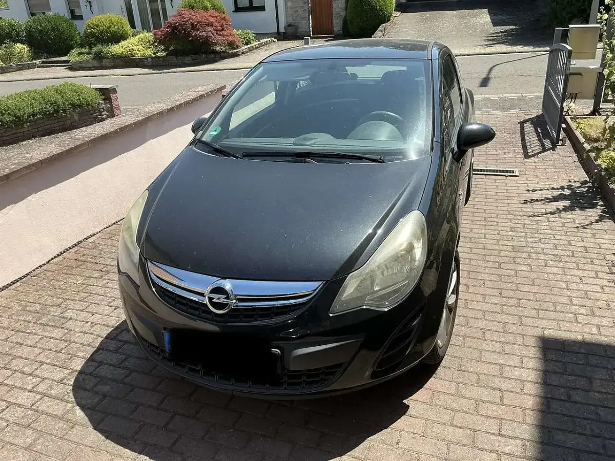 Gebraucht Opel Corsa Active 87 PS (63 kW) 2013 Schwarz Kleinwagen